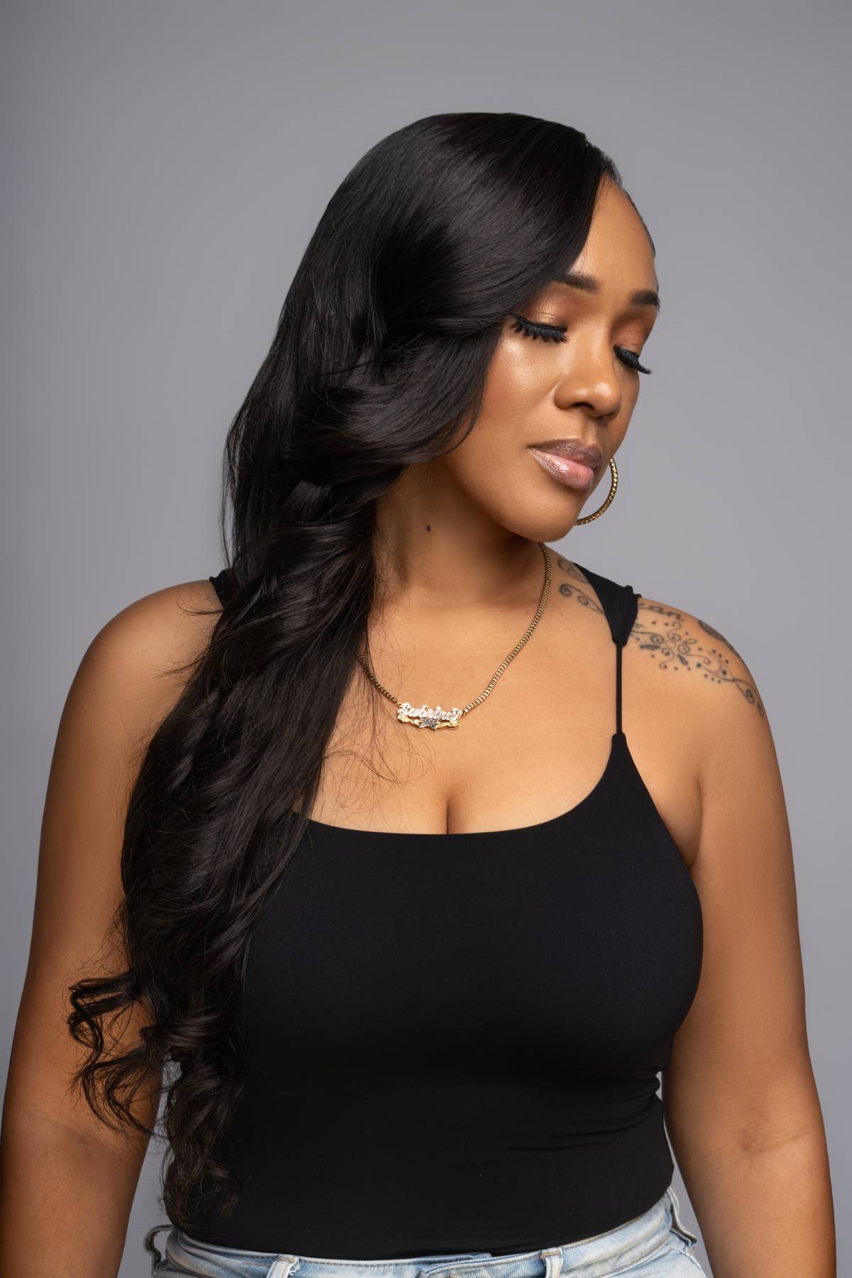 Model with long body wave hair